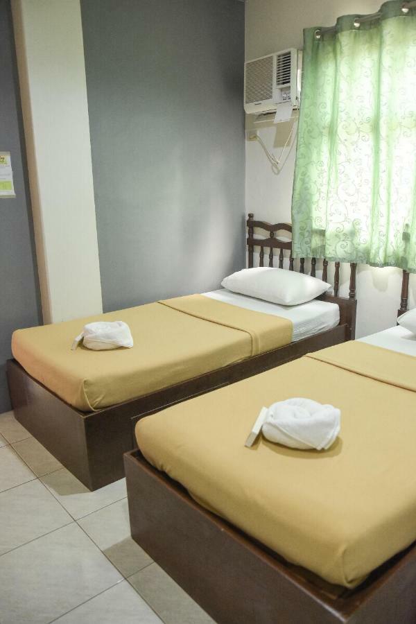 Tiptop Tower Suite Inn Dumaguete City Cameră foto